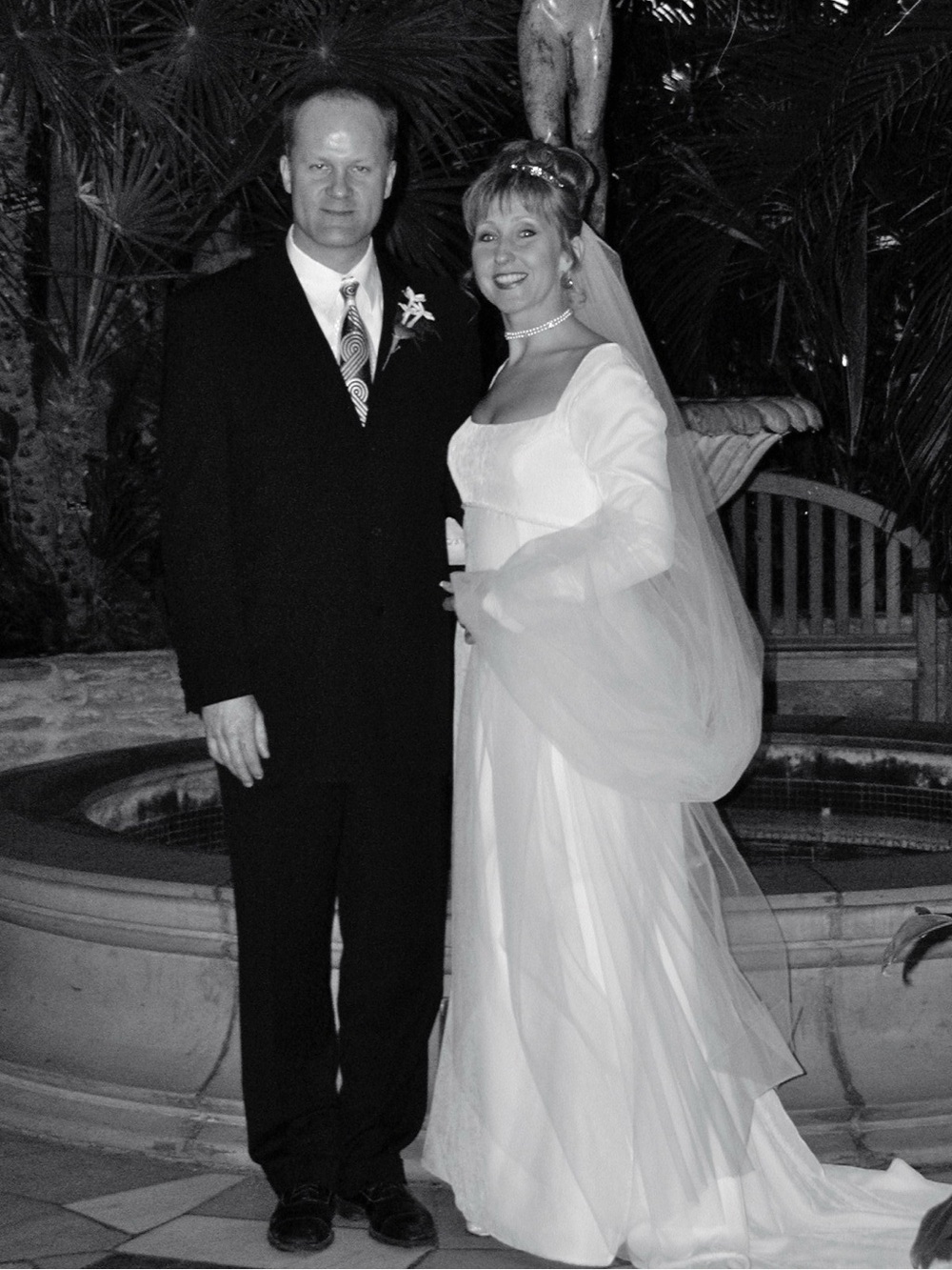 Elegant White Bridal Gown with Sheer Long Veil